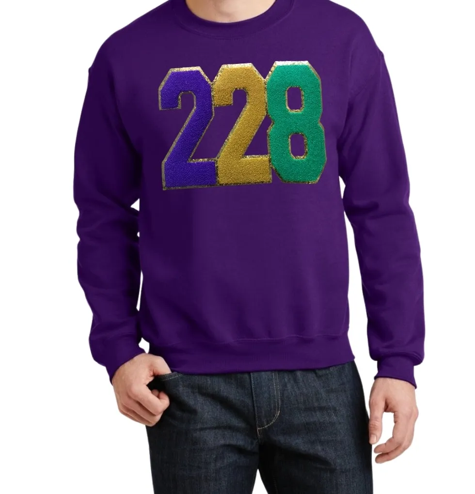 "Mardi Gras Magic: Purple Long Sleeve T-Shirt with Grand Embroidered Patch"